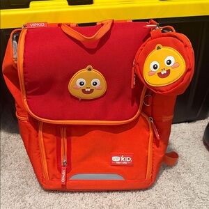 VIPKid orange backpack.